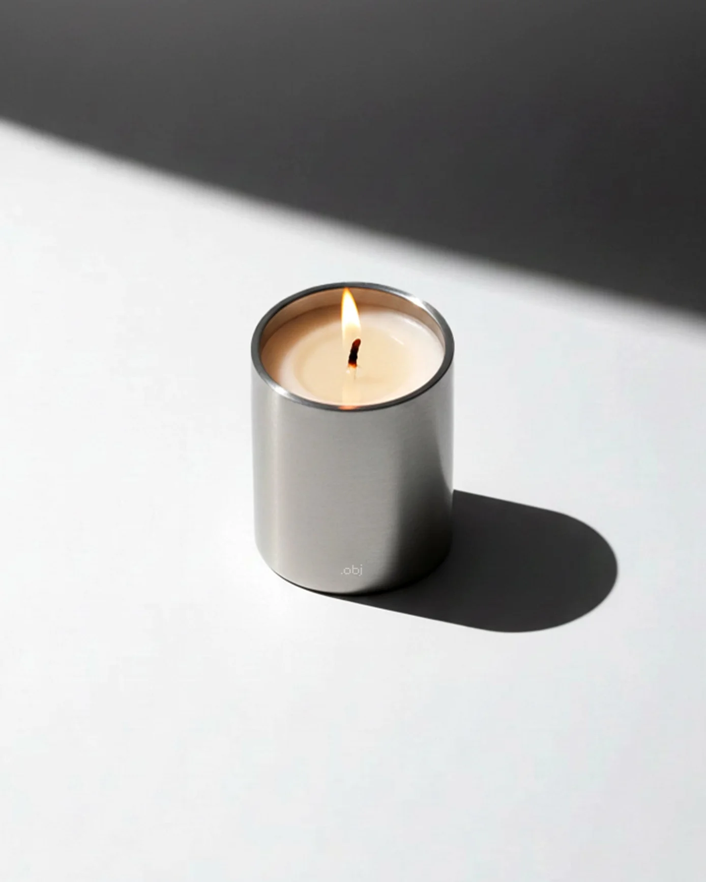 On-brand .OBJ Studio candle launch image